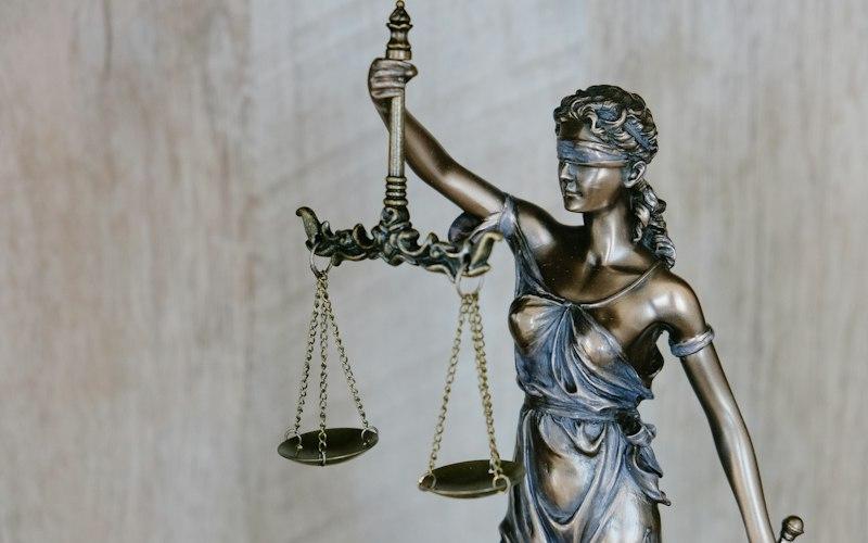 Lady Justice statue representing law firm IT clients